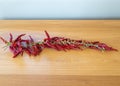 Vibrant dried red hot chili peppers on a string