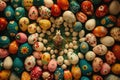 Vibrant Easter display with a multitude of intricately painted eggs and a central bunny figurine on green straw