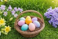 Vibrant Easter egg hunt in blooming garden, pastel-colored eggs in wicker basket hidden among the flowers and green grass on sunny Royalty Free Stock Photo