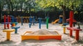 Vibrant Empty Playground Sandbox Balance Beam and Play Structures in a Sunny Park