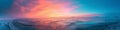 Vibrant extra wide panoramic sky. Vibrant stormy sunset sky over a vast frozen lake Royalty Free Stock Photo