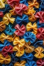 Vibrant farfalle pasta in a striking pattern of red, blue, and yellow. Royalty Free Stock Photo