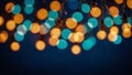 Festive String Lights with Orange and Teal Bokeh on Dark Background Royalty Free Stock Photo