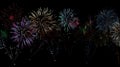 Vibrant Fireworks Display, Exploding Colors Light Up the Night Sky with Brilliant Flashes and Sparkling Trails, Cre