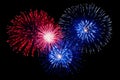 Vibrant fireworks illuminating the night sky at midnight, ushering in the new years celebration. Royalty Free Stock Photo