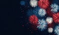 Vibrant fireworks in red, white and blue burst against a dark night sky Royalty Free Stock Photo