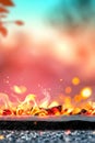 Vibrant flames and glowing embers with soft bokeh background Royalty Free Stock Photo
