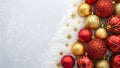 Festive Red and Gold Christmas Ornaments on Snow with Copy Space Royalty Free Stock Photo