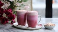 vibrant flavors of nature with two pink beetroot lattes, served in elegant glasses on a chic marble table. Royalty Free Stock Photo