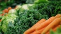 Fresh Produce: Carrots and Kale Display Royalty Free Stock Photo