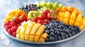 Vibrant fruit platter on white surface perfect for health ads with ample space for text