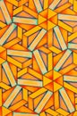 A hand coloured pen and pencil pattern in shades of bright yellow and orange. Royalty Free Stock Photo