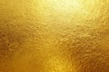 Vibrant Gold Foil Texture Wall Background with Gloss Light Reflection Royalty Free Stock Photo