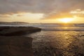 Vibrant, golden sunrise over the limestone coasts of El Medano, Tenerife, Canary Islands, Spain Royalty Free Stock Photo