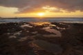 Vibrant, golden sunrise over the limestone coasts of El Medano, Tenerife, Canary Islands, Spain Royalty Free Stock Photo