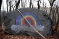Vibrant graffitied boulder