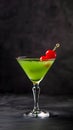 Generative AI. Green Apple Martini Cocktail Garnished With a Red Cherry Served in a Classic Glass Royalty Free Stock Photo