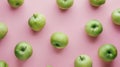 Vibrant Green Apples on Pink Background Flat Lay