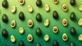 Vibrant green avocados arranged in a repeating pattern on a gradient background Royalty Free Stock Photo