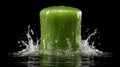 Vibrant green liquid splash on a black background. Royalty Free Stock Photo