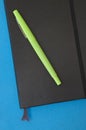 Vibrant Green Pen and Notebook Royalty Free Stock Photo