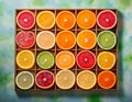 A vibrant grid display of assorted citrus fruits slices