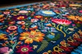 Vibrant hand made quilts with stylized Hungarian motifs like flowers, birds or village scenes. Focus on the handcrafted textiles