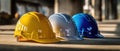 The vibrant hard hats arranged on a construction site table for safety awareness. AI generated image Royalty Free Stock Photo