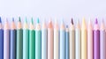 Vibrant Harmony: A Whimsical Array of Colorful Pencils Dancing on a Blank Canvas Royalty Free Stock Photo