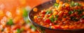 Vibrant Homemade Lentil Stew with Fresh Vegetables in a Black Bowl, Healthy Vegan Meal Closeup with Bokeh Background Royalty Free Stock Photo