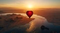 Hot Air Balloon Flying Over a Body of Water Royalty Free Stock Photo