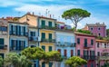 Colorful houses on the coast of Cotidian, in the style of Italian landscapes Royalty Free Stock Photo