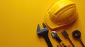 Celebrating Labor Day with Construction Tools and Yellow Helmet Royalty Free Stock Photo