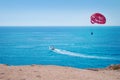 Vibrant image of two people parasailing Royalty Free Stock Photo