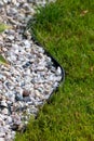 A vibrant image of a well-maintained garden with a neat gravel edge. Royalty Free Stock Photo
