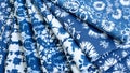 Vibrant indigo batik fabrics with traditional white patterns Royalty Free Stock Photo