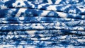 Vibrant indigo batik fabrics with traditional white patterns Royalty Free Stock Photo