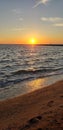 Vibrant and inspiring sunset over Water in New England in summer