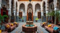 Vibrant interior of a traditional Marrakech riad, showcasing ornate tile work, richly colored fabrics, and a central courtyard