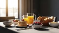 Hearty Breakfast Spread with Pancakes, Fresh Berries, and Orange Juice Royalty Free Stock Photo
