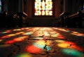 Colorful light patterns on the floor from stained glass windows in a church Royalty Free Stock Photo