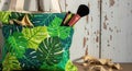 Tropical leaf print makeup bag with brushes stylish storage for cosmetics and beauty essentials Royalty Free Stock Photo