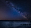 Vibrant Milky Way composite image over landscape of Beautiful se Royalty Free Stock Photo