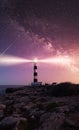 Vibrant Milky Way composite image over landscape Cap Artrutx Lighthouse on the mediterranean island of Menorca