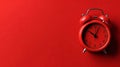 Vibrant minimalist backdrop with retro red alarm clock indicating urgency Royalty Free Stock Photo