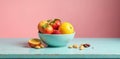 A vibrant mix of fresh fruit in a pastel bowl, accompanied by a selection of nuts and a citrus slice, arranged on a rustic light Royalty Free Stock Photo