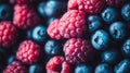 Vibrant Mixed Berries Closeup: Raspberries and Blueberries Texture Royalty Free Stock Photo