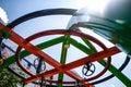 Vibrant Modern Playground Equipment with Colorful Circular Structures Under Bright Sky Royalty Free Stock Photo