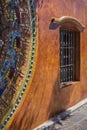 Vibrant Mosaic and Window in Mexican Sunlight