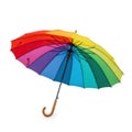 A vibrant, multi-colored rainbow umbrella with a wooden curved handle, isolated on a white background isolated on Royalty Free Stock Photo